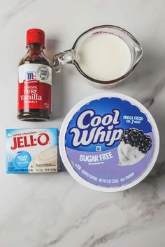 ingredients to make an ice cream smoothie including yogurt, sugar and jelly