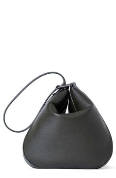 Creative Director Albert Kriemler creates the perfect everyday bag in this slightly slouchy hobo made from napa calfskin with signature trapezoid-ring hardware. Magnetic flap closure Adjustable shoulder strap Interior zip pocket Leather Imported Designer Handbags Structured Leather Hobo Bag For Everyday Use, Evening Hobo Bag In Textured Calf Leather, Contemporary Leather Shoulder Bag With Detachable Strap, Evening Textured Calf Leather Hobo Bag, Structured Leather Bucket Bag For Everyday, Modern Leather Hobo Bag With Top Handle, Modern Soft Calf Leather Bucket Bag, Leather Office Bucket Bag With Handle Drop, Modern Leather Top Handle Hobo Bag