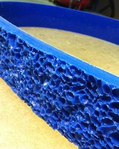 a close up view of some blue plastic