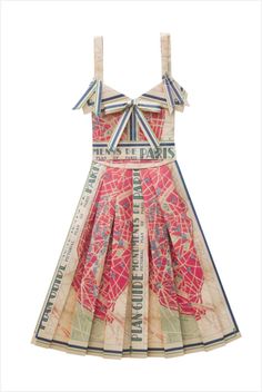 a dress made out of paper with an image of paris on the front and back