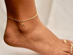 "For the Butterfly lover! A detailed 14K Gold Vermeil or Sterling Silver Butterfly Charm dangling off of our super cute Twisted Sparkling Anklet. We carry this high quality anklet in three sizes to get a perfect fit, 8\",9\",10\" and 11\". To find your size, measure your anklet with a string then lay on a ruler to determine your size. The most comfortable fit is just below the ankle bone although many women like the higher look as well! Size 10 is the most common size for the majority of women. Queen Accessories, Anklets Gold, Gold Thumb Rings, Gold Toe Rings, Anklet Silver, Butterfly Anklet, Anklet Gold, Silver Ankle Bracelet, Anklets For Women