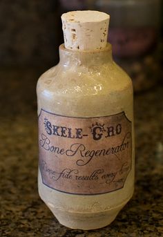 an old bottle sitting on top of a counter