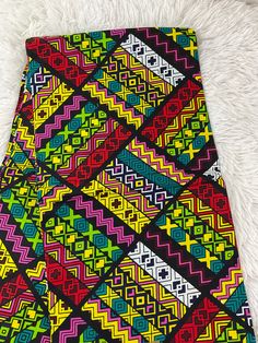 This red and yellow African Fabric is high quality African print made from 100% cotton and it's 45 inches wide. It is used for making African Clothing, African quilts, & For Home decoration. FYI: Print is Double sided. The listing is for 1, 6 yards and Headwrap Each piece of fabric measures:  36in by 45in for 1 yard 216in by 45in for 6 yards 70in by 22in for Head wrap If you purchase more than one yard, you will receive one continuous piece. *If you require more than what I have listed, feel fre Colorful African Patterns, African Quilts, Clean And Press, African Prints, African Pattern, Ankara Fabric, Red And Yellow, African Fabric, Head Wrap