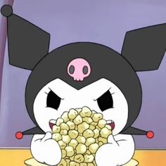 a cartoon character holding a bowl of popcorn