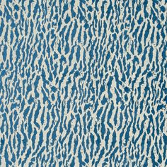 a blue and white animal print area rug