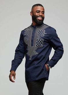 Style#: M2042NVY Inspired by traditional African attire, this is an essential top for a cultured... Traditional Long Sleeve Shirt For Eid, Traditional Embroidered Shirt For Formal Occasions, Traditional Long Sleeve Shirt With Patterns, Festive Long Sleeve Tops With Traditional Patterns, Fitted Long Sleeve Tops With Traditional Patterns, Style Outfits Men, African Embroidery, Mens Tunic, Modern African Clothing