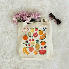 Go easy on the environment and carry your groceries, books, or just about anything in this 100% cotton tote bag!• Q U I C K • F A C T S •♥ Design is digitally printed on one side of the bag♥ Material: 100% cotton♥ Size: 15 3/4 inches by 15 ¼ inches♥ Handle length: 21 ½ inches♥ Spot clean by hand for best results• S H I P P I N G • T I M E S •♥ Our items are individually made with love for each of our buyers. ♥ We’re work as quickly as possible, but we realize speed is important to our customers! Bags Cottagecore, Fruit Tote Bag, Cottage Core Clothes, Cottagecore Bag, Bag Painting, Vegetable Bag, Aesthetic Tote Bag, Tote Bag Aesthetic, Summer Tote Bags