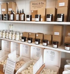 the shelves are filled with many different types of jars and containers, all labeled with labels