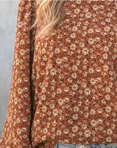 Details Rust Orange with Fall Daisy Pattern Round Neck, Long Sleeve Romantic-Boho Style Made in USA Materials & Care 100% Polyester Machine Wash Cold Gentle, Lay Flat Earth Tone Flowers, Fall List, Romantic Boho, Orange Top, Daisy Pattern, Rust Orange, Fall Floral, Ethical Fashion, Shop Blouses