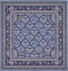 a blue rug with an intricate design on it