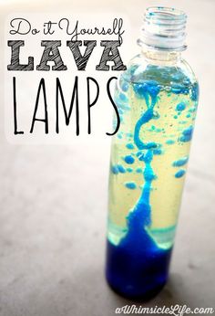 a bottle filled with blue liquid sitting on top of a floor next to the words do it yourself lava lamps