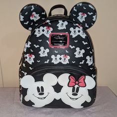 Nwt Loungefly Disney Mickey And Minnie Mouse Halloween Glow In The Dark Mini Backpack Only Bubble Wrapped, Boxed Pet Free And Smoke Free Home Polyurethane; Polyester Lining Approx. 8"" W X 10"" H X 5"" D #Loungefly Disney Halloween Backpack Second Image Shows The Glow In The Dark Features Loungefly Halloween Glow In The Dark Backpack Black Minnie Mouse Backpack For Back To School, Black Minnie Mouse Bag For Back To School, Back To School Minnie Mouse Black Backpack, Black Mickey Mouse Backpack For Daily Use, Black Minnie Mouse Standard Backpack, Black Mickey Mouse Bag For Back To School, Black Minnie Mouse Backpack For Everyday Use, Cute Black Mickey Mouse Backpack, Cute Black Minnie Mouse Backpack