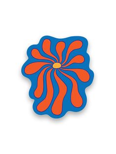 an orange and blue flower on a white background