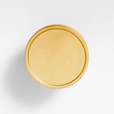 an image of a gold plate on a white background that looks like it could be used for something else