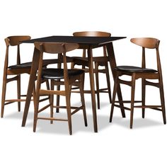 the table and chairs are made from wood with black leather upholstered seat cushions