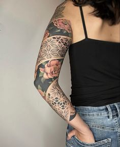 a woman with a tattoo on her arm