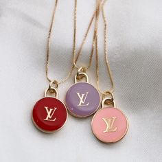 Multi-colored charms from an authentic LV bag charm reworked as pendants. Product details: limited availability necklace length: 17.7 inches necklace material: 18k gold plated pendant measurements: 16mm Lv Bag Charm, Louis Vuitton Necklace, Authentic Louis Vuitton Bags, Red Charm, Quirky Jewelry, Pink Charm, Cute Nike Shoes, Purple Necklace, Colourful Necklace