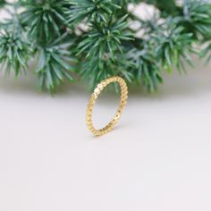 Your Dainty Dot Ring is stylish, dainty and pretty ideal for everyday use. Details of solid gold handmade Flat Bead Eternity Band are very eye-catching. It is a great gift for your loved ones. This jewelry will be an indispensable piece of yours. This meaningful Flat Bead Stacking Ring with high quality handwork will be a legacy you can leave to your family its.  * Flat Beaded Ring Details * Material / Gold Kt:  14K (585), 18K (750), 8K (333) * Available Gold Colors: Yellow Gold, White Gold, Rose Gold * Band Width: 1.75 mm * Band Thickness: 1.45 mm * The width may differ slightly due to handwork. ❗ WHEN WILL IT BE READY TO SHIP? * 14k-Yellow Gold, Rose Gold, White Gold:3-5 Business Days * 18k-Yellow Gold, Rose Gold, White Gold:3-5 Business Days * 8k-White Gold:3-5 Business Days * 8k-Yellow Yellow Gold Tiny Beads Jewelry For Wedding, Yellow Gold Tiny Beads Wedding Jewelry, Wedding Jewelry In Yellow Gold With Tiny Beads, Yellow Gold Wedding Jewelry With Tiny Beads, Elegant Beaded Wedding Rings, Gold Beaded Wedding Rings, Beaded Stacking Rings, Dot Ring, Beaded Ring