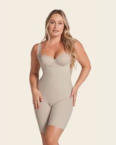 Undetectable step-in mid-thigh body shaper#color_802-nude Compression Beige Shapewear With Built-in Bra, Beige Compression Shapewear With Medium Bust Support, Beige Compression Shapewear With Built-in Bra, Beige Shapewear With Built-in Bra, Mid-thigh Length, Beige Shapewear With Built-in Bra Mid-thigh Length, Beige Mid-thigh Shapewear With Built-in Bra, Compressive Beige Shapewear Mid-thigh Length, Beige Compressive Mid-thigh Length Shapewear, Mid-thigh Length Sculpting Shapewear With Smoothing Detail