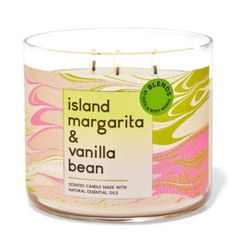 island margarita and vanilla bean candle in a glass container with a label on the front