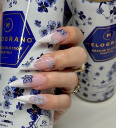 Blue Acrylic Nails Flowers, Blue Nails Flowers, Blue French Tip Almond Nails, Blue Nail With Flower Design, Blue Nails With 3d Flowers, Blue Nails With Flowers, Blue Flower Almond Nails, Dark Blue Flower Nails, Blue Flower Nails