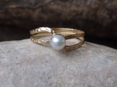 Gold Filled Pearl Solitaire Ring, Bridal Pearl Ring, Fresh Water White Pearl Gold Ring, Pearl Bride Ring, Round Pearl Ring, Delicate Ring Gold filled pearl ring that would be a great wedding accessory for bride, mother of bride, mother of groom and bridesmaids. Metal: 14K Gold Filled Gemstone: Fresh Water Pearl Size: 7-8 US Pearl Size: 4 mm The ring will be packed in a gift box. FOR MY RINGS COLLECTION HERE: https://www.etsy.com/il-en/shop/rebekajewelry?section_id=14282915&ref=shopsection_le White Hammered Jewelry For Anniversary, White Hammered Wedding Jewelry, Hand Forged White Rings For Anniversary, White Hand Forged Rings, Pearl Gold Ring, Bride Ring, Wedding Accessories For Bride, Gold Ear Climbers, Delicate Gold Ring