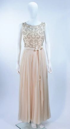 1960's Vintage Buttercream Chiffon Gown with Embellished Bodice Size 2 For Sale at 1stDibs Cream Sleeveless Evening Dress For Party, Cream Sleeveless Party Evening Dress, Cream Maxi Evening Dress For Party, Cream Maxi Length Evening Dress For Party, Sleeveless Cream Evening Dress, Vintage Silk Chiffon Wedding Dress, Vintage Cream Evening Dress, 70’s Fashion, Chiffon Gown