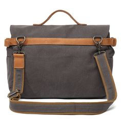 Take a trip back in time with our large vintage canvas messenger bag! This spacious and stylish shoulder bag is the perfect companion for modern adventurers looking for a practical and comfortable fashion accessory. With its traditional style, smart design and ability to hold a 14 inch laptop, this unisex messenger bag is perfect for everyday use or travel. Discover the perfect canvas messenger bag for your daily commute Our vintage canvas messenger bag is a timeless accessory that's perfect for Vintage Laptop Bag With Large Capacity For Travel, Gray Canvas Shoulder Bag Satchel, Gray Canvas Shoulder Satchel, Outdoor Canvas Shoulder Bag Briefcase, Outdoor Canvas Shoulder Briefcase, Outdoor Canvas Satchel With Large Capacity, Gray Canvas Satchel For Travel, Outdoor Large Capacity Canvas Satchel, Canvas Satchel With Laptop Sleeve