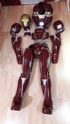 an iron man costume laying on the floor