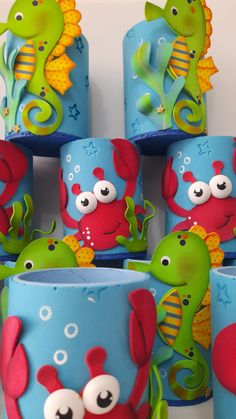 there are many cups that have sea creatures on them