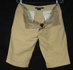 Here's a great, on-trend, pair of Ralph Lauren Sport designer long shorts cut tan khaki summer shorts. You'll love donning these keeper short for all your leisure purposes. Hang out by the waves or go to a summer concert and feel stylin' in these. These unique shorts are such a special addition to your wardrobe and they are in really great pre-loved vintage with no damage or stains. The tag says these classic shorts threads are a size 12 and flat measurements are included here for you to check y Spring Bermuda Shorts In Khaki, Beige Bermuda Cargo Shorts For Summer, Classic Shorts, Ralph Lauren Sport, Vintage Ralph Lauren, Summer Concert, Ralph Lauren Shorts, Long Shorts, Summer Cotton