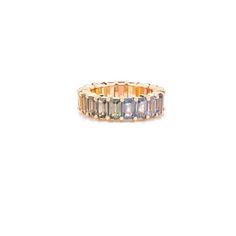 This is part of Chairish’s Fine Jewelry assortment.  7.4 Carat Octagon Cut Rainbow Sapphire Eternity Band Ring in 18k gold symbolizes the everlasting love between a couple. It shows the infinite love you have for your partner. The round shape represents love which will continue and makes your promises stay forever. Sapphire stimulates concentration and reduces stress. Lightweight and gorgeous, this is a perfect Handmade Jewelry, Bridal Shower Gift, Girlfriend Gift, Gift For Sister, Mother Daught Yellow Gold Emerald Cut Eternity Band For Promise Ring, Gold Gemstone Eternity Band For Promise, Gold Eternity Band With Gemstone For Promise, Luxury Stackable Eternity Band For Promise, Luxury Yellow Gold Promise Eternity Band, Luxury Stackable Promise Eternity Band, Promise Eternity Band With Halo In Yellow Gold, Luxury Yellow Gold Eternity Band For Promise, Yellow Gold Gemstone Eternity Band For Anniversary