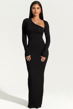 The Eclipse Elegance One-Shoulder Slim-Fit Maxi Dress is a masterpiece of modern sophistication. This sleek black dress features an asymmetric one-shoulder design that adds a touch of contemporary flair to a classic silhouette. The form-fitting cut beautifully contours your figure, while the long sleeves offer a balanced elegance. Perfect for formal events, upscale dinners, or any occasion where you want to make a refined statement. Pair it with minimalist jewelry and stiletto heels for a look that's effortlessly chic and timeless. Long Bodycon Dress Outfit, Bodycon Long Dress, Body Con Dress Outfit, Fitted Maxi Dress, Long Bodycon Dress, Dress Women Elegant, Bodycon Maxi Dresses, Asymmetrical Neckline, Long Sleeve Bodycon