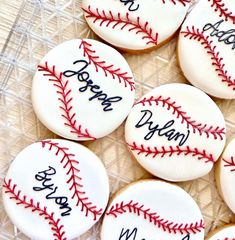 baseball cookies with the names of each team on them