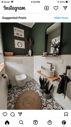 the bathroom is decorated in green and white