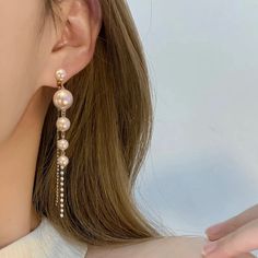 These Elegant And Sophisticated Big Gold Filled Simulation Pearl Long Drop Earrings. Style Them For Daytime, Wear Them At Night Or Dress Them Up For A Fancy Affair. Material : 100% 925 Sterling Silver + White Simulated-Pearl Measurements : Studs Measure 6.5 C (8.50 Cm Long For Diamonds And Small Pearls Chains) Shape: Long Drop Earrings Weight: 0.33 Oz Most Merchandise Ships Within 2 Days All Items Come Packaged In A Small Jewelry Box Which Is For When Buying As A Gift. Rose Gold Dangle Pearl Earrings For Party, Rose Gold Dangle Pearl Party Earrings, Feminine Dangle Pearl Earrings For Party, Pearls Chains, Small Jewelry Box, Long Drop Earrings, Pearl Chain, Small Jewelry, At Night