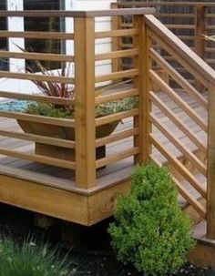 a wooden deck with planters on it