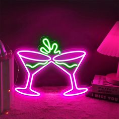 a neon sign with a bow on it