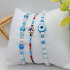 Handmade Evil Eye Beaded Bracelets Set Blue Adjustable Handmade By Ladysjewelrys Blue Spacer Beads Bracelets For Festivals, Blue Festival Bracelets With Spacer Beads, Bohemian Blue Stretch Bracelet With Colorful Beads, Blue Bohemian Stretch Bracelet With Colorful Beads, Blue Bohemian Bracelets With Spacer Beads, Bohemian Blue Bracelets With Spacer Beads, Blue Bracelets With Colorful Beads For Festival, Blue Stretch Bracelet With Colorful Beads For Festival, Festival Stretch Bracelet With Colorful Beads In Blue