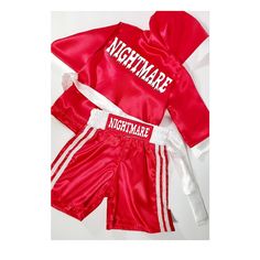 a red and white outfit with the words nightmares on it