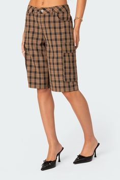 Bermuda shorts Cargo style pockets Plaid patterned fabric Polyester, Spandex Model wears size S Model height is 5'8 Item care: Wash with similar color Cargo Bermuda Shorts, Punk Shorts, Skater Vibes, Baggy Shorts, Cargo Style, Shorts Cargo, Swimwear Dress, Brown Plaid, Patterned Fabric