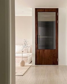 an open door leading to a living room