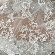 1 Yard Ivory Alencon Lace Fabric, Embroidery Bridal Lace Fabric, Wedding Gown Lace, Cord Lace Fabric dreamy bridal alencon lace fabric  price is for one yard more buying will be cut as one piece Back to shop DIRECTORY https://www.etsy.com/shop/Retrolace?ref=si_shop Elegant Floral Embroidery Wedding Dress, Elegant Floral Embroidered Wedding Dress, Embroidered Lace Wedding Dress For Mother Of The Bride, Beige Intricately Embroidered Fabric For Wedding, Cream Wedding Gown With Lace Trim, Lace Dress With Floral Embroidery For Wedding, Embroidered Beige Lace For Wedding, Beige Embroidered Wedding Lace, Embroidered Beige Wedding Lace