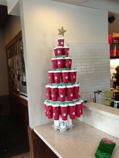 there is a christmas tree made out of cups