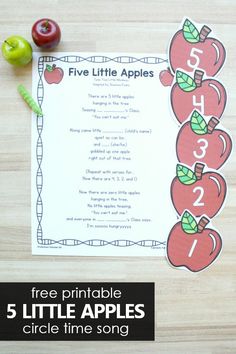 the five little apples song is displayed on a table