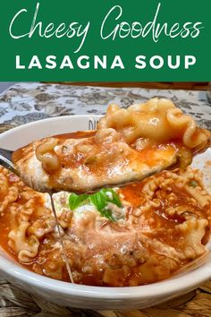 a white bowl filled with lasagna soup on top of a wooden cutting board