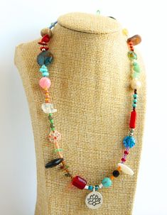 Necklace is 40 cm ( 15.7 inches)  length with 4 cm ( 1.5 inches)  Colors: multicolor. 100% handmade. Other necklaces: https://www.etsy.com/shop/WildBohoCreations?ref=seller-platform-mcnav&section_id=49820717 See the rest of our shop here: https://www.etsy.com/shop/WildBohoCreations The photo may not convey true colors. This may depend on the settings of your screen. In reality, the colors are rich and bright. Open to special orders. All packages ship through Latvia Post. Shipping worldwide (With Bohemian Charm Necklaces With Colorful Beads For Jewelry Making, Bohemian Charm Necklaces With Round Natural Stones, Bohemian Charm Necklaces With Natural Stone Round Beads, Handmade Bohemian Charm Necklaces With Round Beads, Colorful Gemstone Beads Necklace For Gift, Bohemian Handmade Round Beads Charm Necklaces, Bohemian Colorful Beads For Gifts, Bohemian Colorful Beads As Gifts, Long Colorful Beads Crystal Necklace As Gift