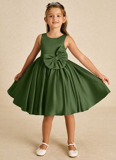 Apple showcases a lovely A-line silhouette in smooth matte satin. With a classic scoop neckline and sleeveless design, it features a stylish bow tie back and playful bows, making it an adorable choice for any whimsical celebration. Sleeveless Dresses With Bow Detail, Solid Color Sleeveless Dress With Bow, Sleeveless Bridesmaid Dress With Satin Bow, Satin Flower Girl Dresses, Olive Flower, Military Ball Dresses, Sage Dress, Special Event Dresses, Lace Bride