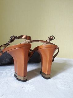 "Vtg tawny, tan brown (with bronze straps) leather women leather slingback shoes. Summer shoes with the 90s square toes and angular block heels (gold color bottoms). EU size 37. Made in Italy. Comfy footwear.European quality. condition: normal condition. A little used, some signs of wear. Shabby bottom soles. Heels height 8,2 cm / 3.2\" in approx. outsole length- 27,4 cm / 10.7\" in size: EU 37 - labeled size; US 6.5" Comfy Footwear, Platform Shoes Heels, Heels Gold, Spring Boots, Slingback Shoes, Shoes Summer, Slingbacks, Women Leather, Spring Shoes