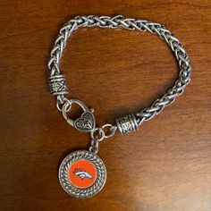 Denver Bronco Bracelet Nwot 8” Broncos Bracelet, Denver Bronco, Denver Broncos, Womens Jewelry Bracelets, Denver, Fast Delivery, Women Jewelry, Bracelet, Silver